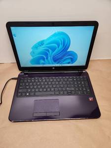 lot 26 image: HP 15 inch Laptop AMD A8 Processor 8GB RAM 512GB Storage
