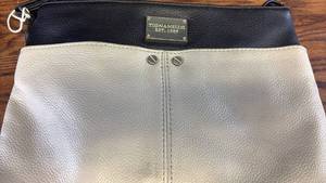 lot 5376 image: Tignanello Black and Cream Leather Handbag with Multiple Compartments