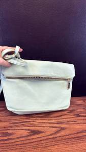 lot 5394 image: Light Blue green Leather Fold-Over Crossbody Bag with Striped Interior