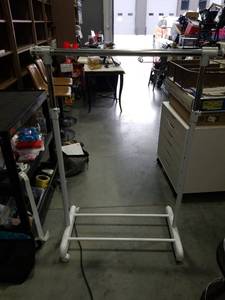 lot 3794 image: White Metal Garment Rack with Rolling Wheels
