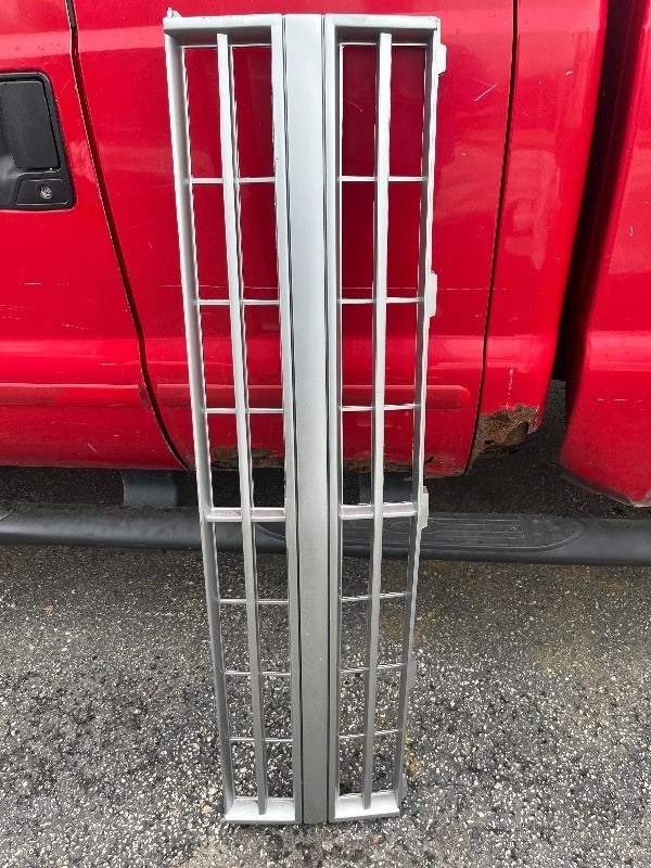 lot 53 image: Chevy Grill Replacement - Grey CV07027GA see images