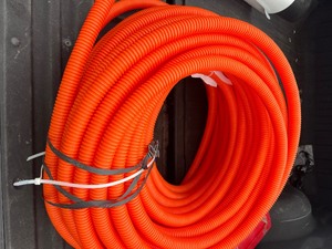 lot 29 image: 1 x 100 Orange Pex PVC Corrugated Pipe
