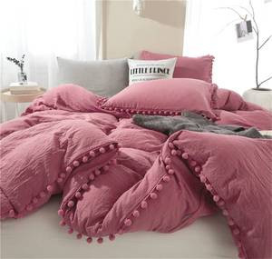 lot 23196 image: IHOUSTRIY Duvet Cover Full Size,100% Washed Microfiber 3pcs Bedding Duvet Cover Set, Pom Poms Fringe Solid Color Soft and Breathable with Zipper Closure & Corner Ties (Dusty Rose, Full) - Retail $40