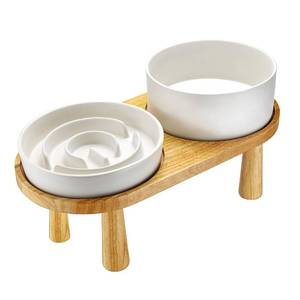 lot 23222 image: MOPANG Ceramic Slow Feeder and Water Bowl Set for Small Dogs, 6.0 Inch Ceramic Dog Bowls Elevated with Wooden Stand, 0.6 Cups Dog Slow Feeder(14oz) and 30oz Water Bowl Set, White - Retail $46