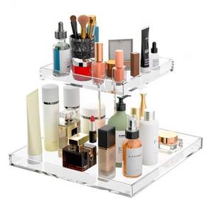 lot 24799 image: Hongtuocb 2-Tier Acrylic Perfume Organizer, Display Stand for Dresser & Counter, Vanity Trays Makeup Storage Holder, Bathroom & Kitchen Organizer (12x8) - Retail $22