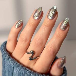 lot 28953 image: Glamnetic Press On Nails x Harry Potter - Unicorn Blood  Short Almond Fake Nails with Silver Chrome & 3D Swirl Design, Salon Quality Officially Licensed  15 Sizes - 30 Nail Kit with Glue - Retail $22