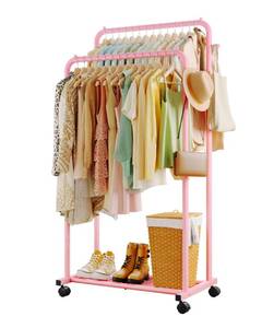 lot 61936 image: Sakugi Clothes Rack - Double Rods Clothing Rack with Mesh Shelf, Hooks & Wheels, Metal Clothing Racks for Hanging Clothes & Bags, Multifunctional Garment Rack for Laundry, Pink, 28.7 x 16.5 x 59.1 - Retail $35