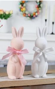 lot 46396 image: 2 Pack Flocked Bow Tied Bunny Set- Pastel Bunny Decor for Spring Home Shelf Mantel Table Windowsill Party Decor - Retail $7