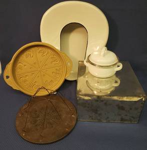 lot 23 image: Vintage BlackWhite Enamelware Bed Pan 14inL x 17in W, Lidded Tin Bisquit Box, Enamelware Individual Casserole, Antique Stovetop Toaster, and Brown Bag Cookie Art Crockery Shortbread Mold by Hill Design 1988