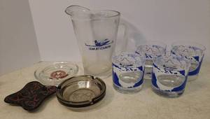 lot 54 image: Vintage Lear Jet-Country Pitcher and Set of 4 On the Rocks Glasses and 3 Vintage Glass Ashtrays
