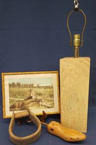 lot 60 image: Large Wood Base Lamp, Vintage Wood Stirrup, Antique Wood & Iron #2 Shoe Stretcher, and Vintage Moose Kill Hunting Photo Print in Bamboo Design Carved Wood Frame 13.75in W x 10.75in T