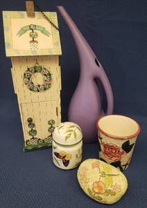 lot 68 image: Handpainted Wood Garden Butterfly House - 15in T, Rose Planter, Ceramic Butterfly Shaker, Resin Garden Stone, and Vintage Purple Plastic Watering Can