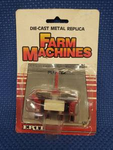 lot 93 image: Vintage 1990 ERTL Farm Machines - Die-Cast Metal Replica - 164 Scale - CASE International Planter - #478 - in Original Package