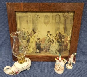 lot 97 image: Antique Victorian Lithograph in Custom Solid Oak Frame 14in W x 12.5in T, Vintage Porcelain Victorian ManWoman Figurines Stamped Made in Occupied Japan - Tallest 4in, and Porcelain Shoe Oil Lamp witn Rose Design & Gold Trim 8.5in T