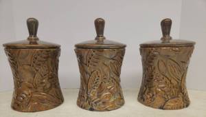 lot 100 image: Set of 3 Verdigris Glazed Embossed Design Lidded Studio Pottery Deco Canisters - 10in T x 6in W