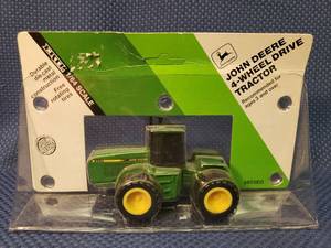 lot 118 image: Vintage 1991 ERTL John Deere 4-Wheel Drive Tractor #5603EO - Die-Cast 164 Scale - in Original PackageUnopened
