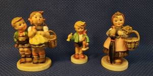 lot 123 image: Vintage Collectible Hummel Goebel Germany Figurines 1965 On Holiday #350 4.5in T, 1967 Boy with Toy Horse 3.5in T #239C, and 1960-63 To Market 4.5in T #4930- All SignedStamped with Original Stickers