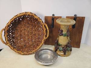lot 129 image: Vintage Majolica Pottery Grape Design Candle Stand 11in T x 6in W, Handled Basket 14in W x 7.5in T, Pair of WoodMetal Wall Hook Plaques, and Wilton Pewter Wine Caddy