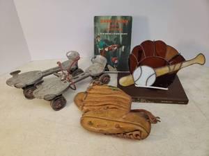 lot 145 image: Vintage Metal Skates with Key, Old Leather Diamond King S-114 Baseball Mit, Stained Glass Basball Sun Catcher 10.5in L x 7in T, and Vintage Books
