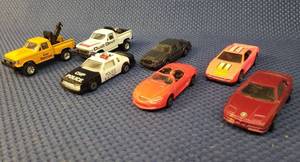 lot 155 image: Vintage MAISTO Die-Cast Toy Cars Buick LeSabre Stock Car CHP Police, Dust Devil Pickup, Car Tow Servicie Pickup, Lincoln Mark VII Sedan, Mustang Mach III, BMW 850i, and 1990 Hotwheels Ferrari 340