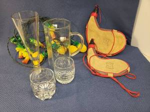 lot 173 image: Vintage Suede Leather Canteen BotaBoda Bags - Made in Spain - 1QT & 12QT, Palm & Pinapple Patio Lights - Work, Pair of Crown Royal On the Rocks Glasses, Pilsner Beer Glass, and Paneled Glass Martini Pitcher