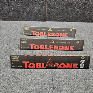 lot 467 image: Lot of 3 , Toblerone Dark Chocolate Bar with Honey and Almond Nougat, 3.52 oz BB JUNE 22, 2026