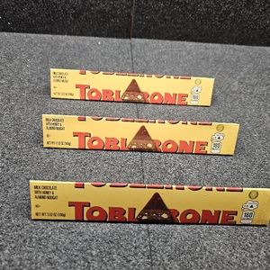 lot 468 image: Lot of 3, TOBLERONE Swiss Milk Chocolate Candy Bar - 3.52oz