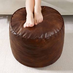 lot 19582 image: HIGOGOGO Round Stuffed Pouf Ottoman, Pu Leather Poufs with Foam Chunk Filling, Furry and Fluffy Pouf Foot Stool Storage Ottoman, 20 X 15 Floor Poufs Foot Rest for Living Room,Dark Brown