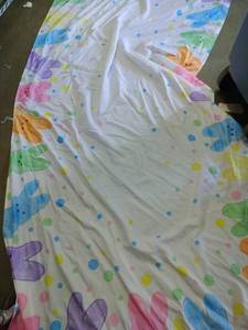 lot 2111 image: Easter Bunny theme tablecloth approximately 9 ft by 4 ft