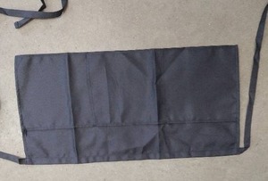 lot 2114 image: Black waders aproncarpenters apron