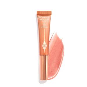 lot 12027 image: Charlotte Tilbury Glowgasm Beauty Light Wand Liquid Highlighter Makeup - Soft-Focus Pink Highlighter & Blush for Cheeks - Pearlescent, Weightless Radiant Finish - Peachgasm (Used)