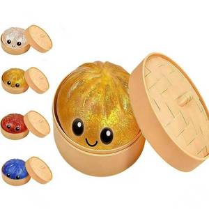 lot 14015 image: Glitter Dumpling Squishy, 2026 New Bun Squeeze Stress Relief Ball with Steamer Box for Stress Relief, More Surprises (Yellow)