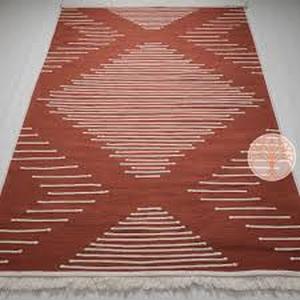 lot 13406 image: OrangeBrown and White Waterproof Outdoor Rug with Geometric Pattern 112 x 96 in