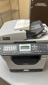 lot 11618 image: Brother MFC-8680DN Laser All-in-One Printer with Manual Has good ink cartridge