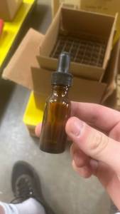 lot 15094 image: Amber Glass Dropper Bottle with Black Cap