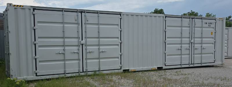 lot 1042 image: One Way Trip 40 Long Tall High Cube Container with Double Rear & Two (2) Side Double Doors - Used One Time To Ship To Mother Road Auctions & SalesSide Damage See PicsDelivery Available