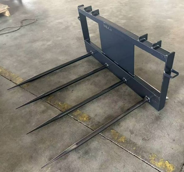lot 4621 image: Unused JCT Skid Steer Bale Spear Attachment with Quadruple (4) Tines