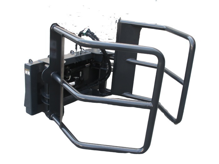 lot 2065 image: Unused Wolverine Skid Steer Hydraulic Adjustable Bale Squeeze  BSH-12-75D - Twin Cylinders - 2,400lb Lifting Capacity