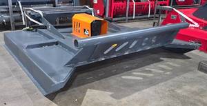 lot 1836 image: Unused Handy 78 Skid Steer Brush Cutter  HSBC78  Very Heavy Duty with Three 5-inch-Wide Cutting Blades Attached to a Half Inch Thick Rotating Plate  Damaged During Transport, See Pics