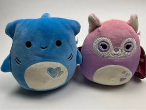 lot 193 image: Squishmallows Plush Toys Blue Shark and Purple Racoon Set