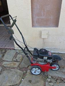 lot 14 image: Yard Machines by MTD 3.5HP 9-Inch Gas Lawn Edger (Has Compression)