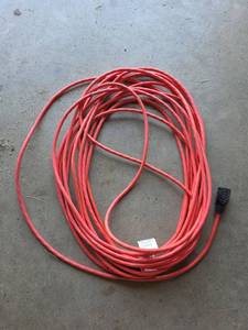lot 31 image: Heavy Duty Red Outdoor Extension Cord 16 AWG SJTW