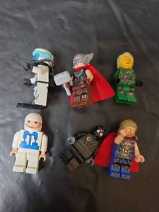 lot 238 image: LEGO Superhero Minifigures Set of 6 with Thor and Lloyd Ninja