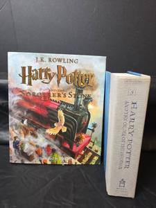 lot 255 image: Harry Potter and the Sorcerers Stone Harry Potter and The Order of the Phoenix Illustrated Edition by J.K. Rowling