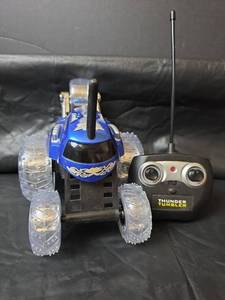 lot 379 image: Thunder Tumbler Remote Control Stunt Car with Controller