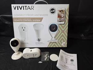 lot 383 image: VIVITAR Wi-Fi Smart Home Remote Control System Kit  plus extra Plug and Camera