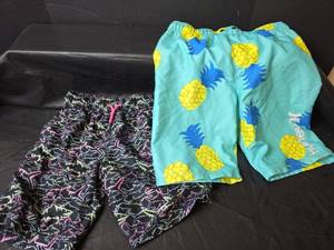 lot 397 image: Boys Swim Shorts Bundle - Pineapple Print and Shark Pattern