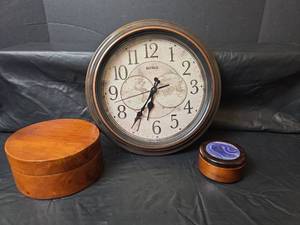 lot 507 image: Benrus Wall Clock with World Map Face and Wooden Handcarved Dishes with Lids