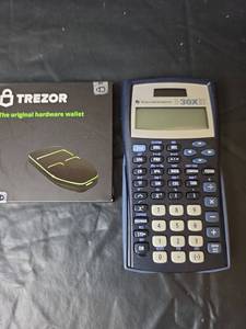lot 525 image: New In BoxNever Opened - Trezor Hardware Wallet with TI-30XIIS Calculator
