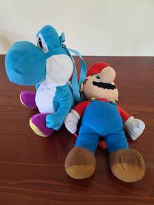 lot 544 image: Super Mario and Blue Yoshi Plush Backpack Set